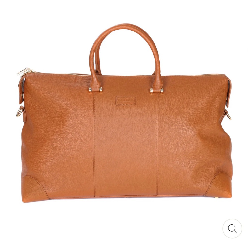 Brand new with tags. 100% leather weekend bag. 2 belts included. Gold hardware